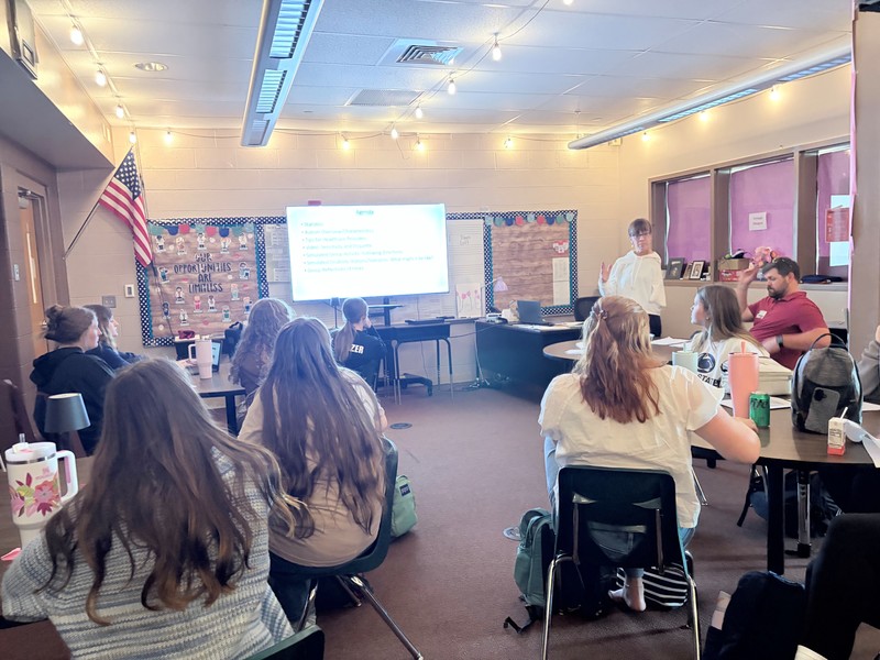 Students and instructor in Health Occupations learning about disability awareness.