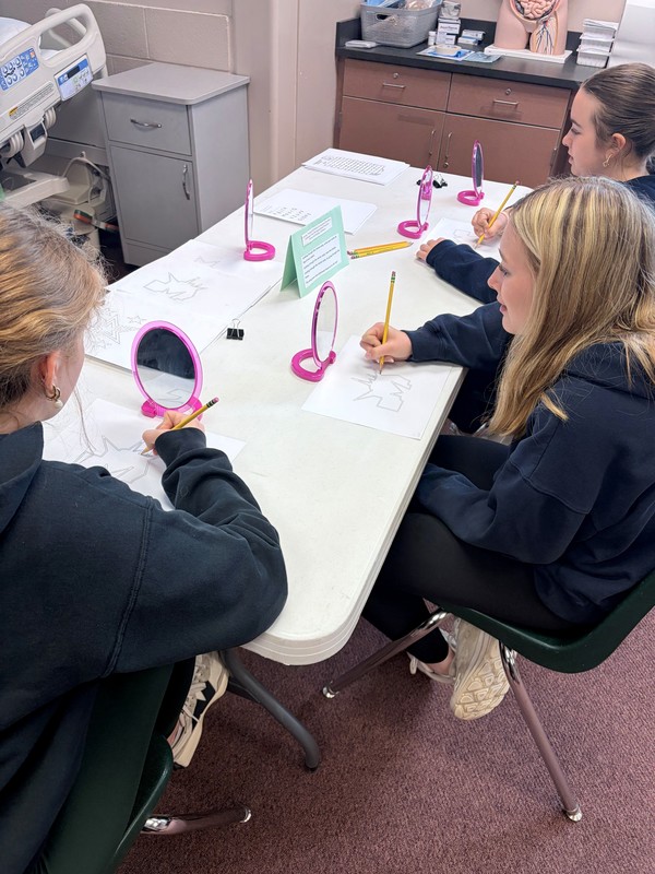 Student in disability awareness training.
