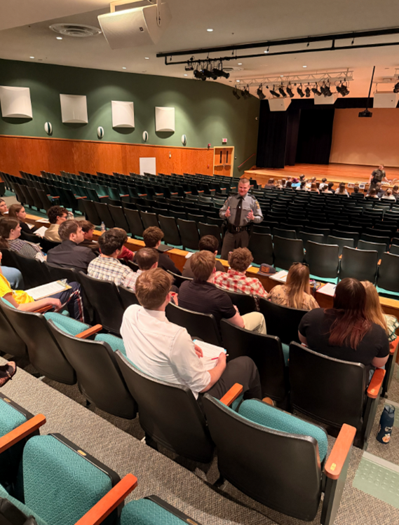 Government Day at WAHS and the State Police present to students.
