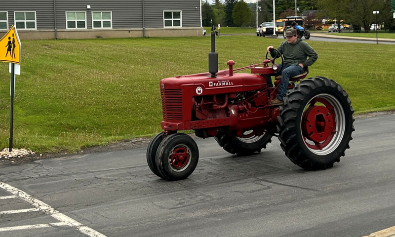 Driving the Farmall to school.