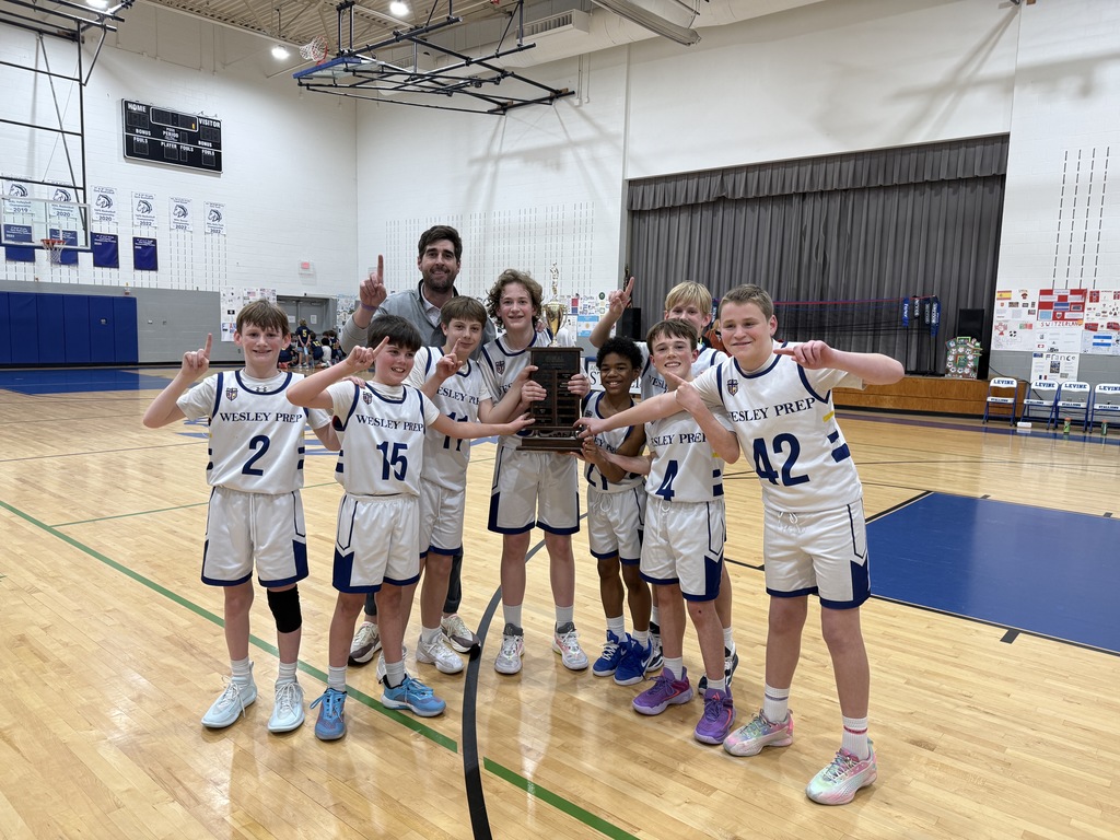 Wesley Prep boys basketball team poses for their championship win