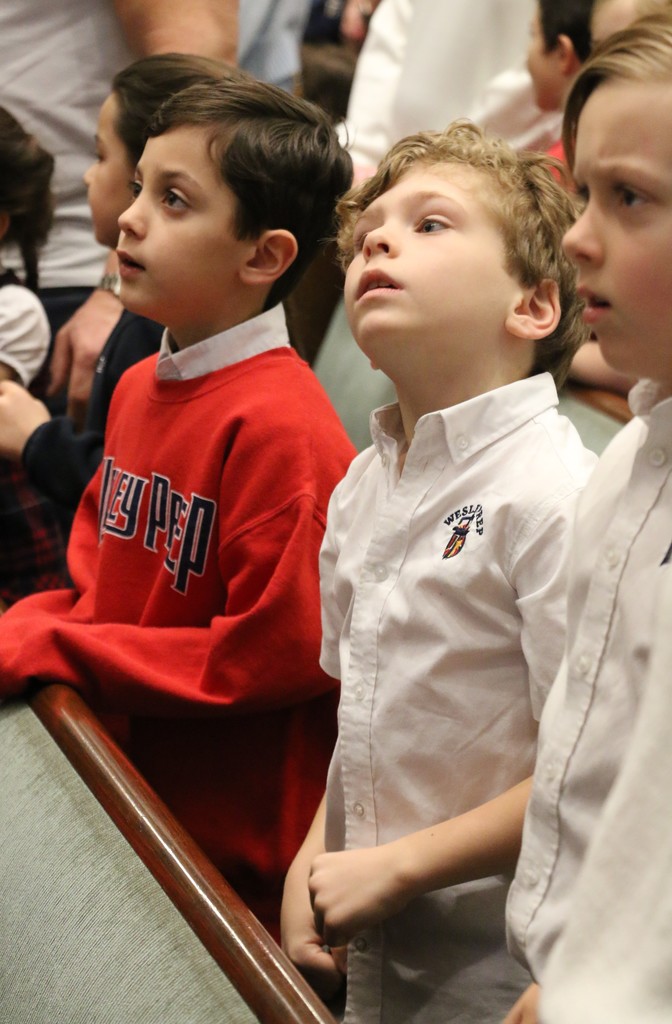 Students singing during Chapel Service.