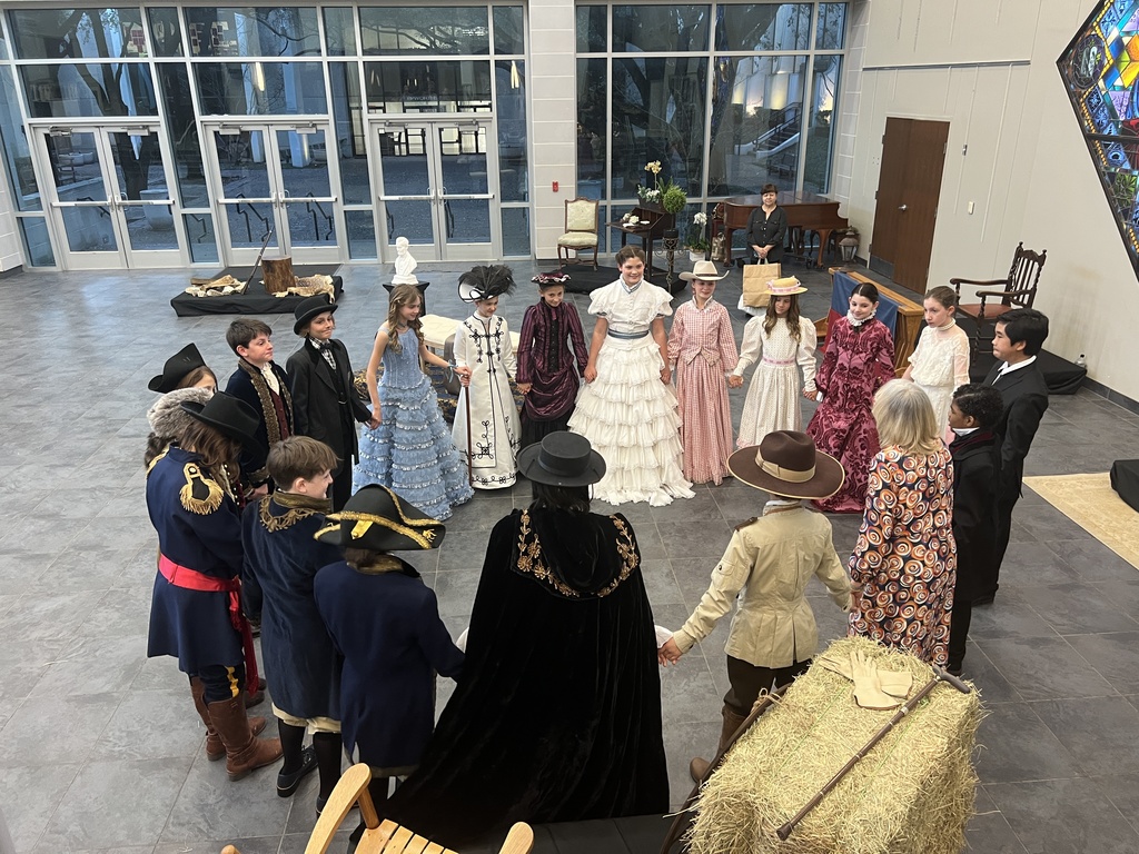 The fifth graders join hands just before their portion of the program begins!