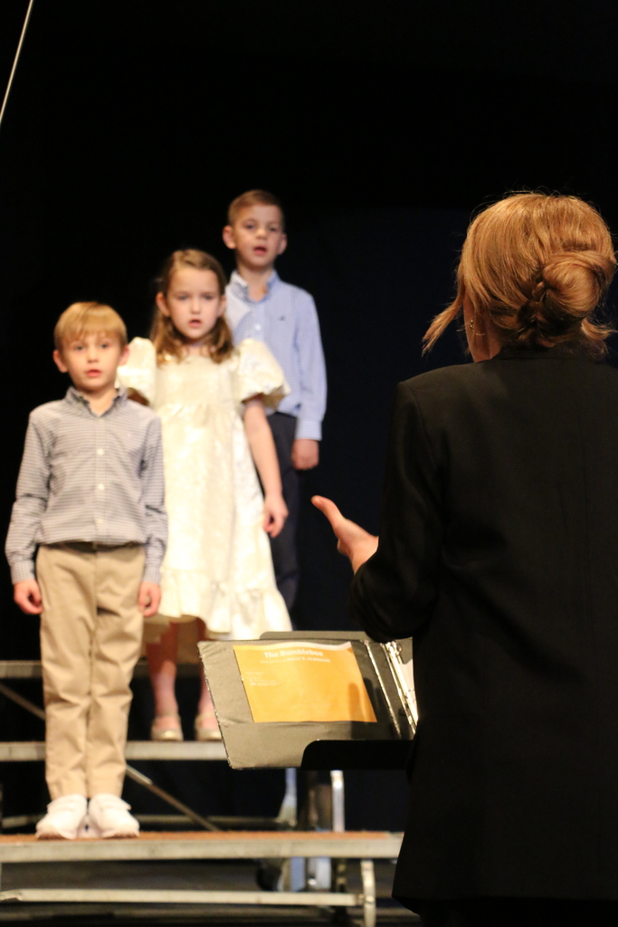 Primer students watch Ms. McMillin closely for instruction.