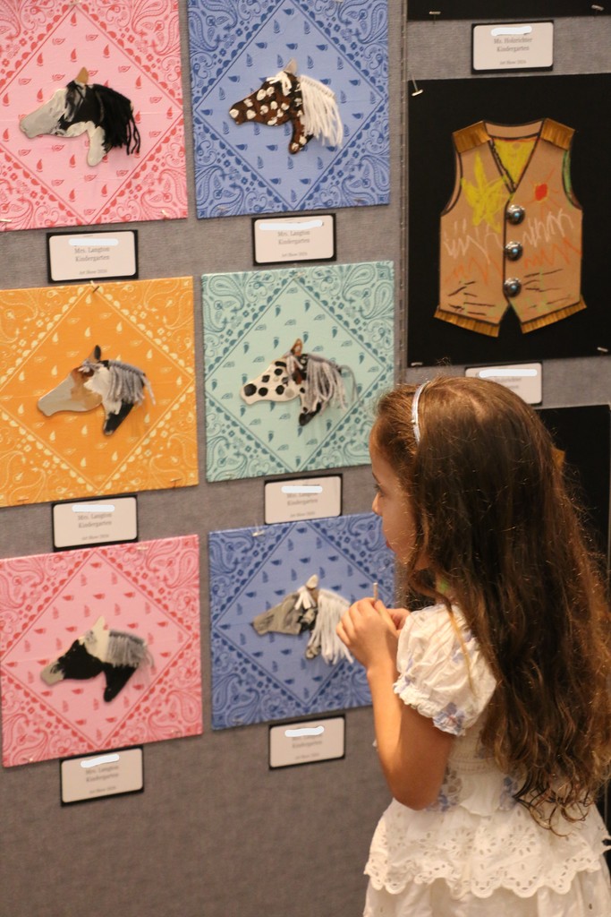 Student looking at the artwork.