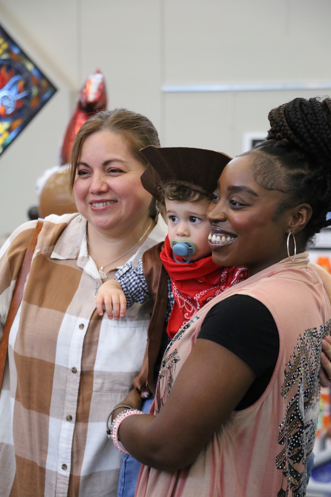 Early childhood teachers with their student.