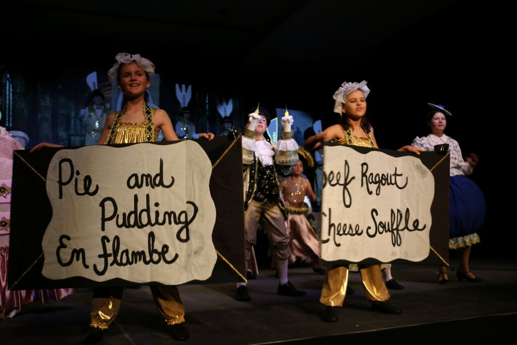 Cast during "Be Our Guest".