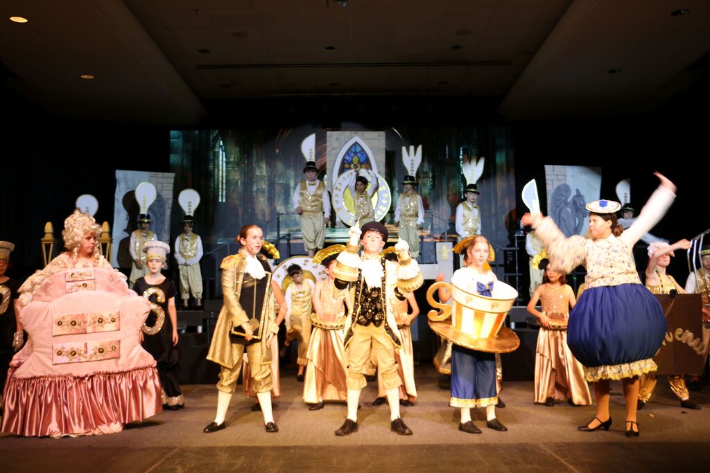 Cast during "Be Our Guest".