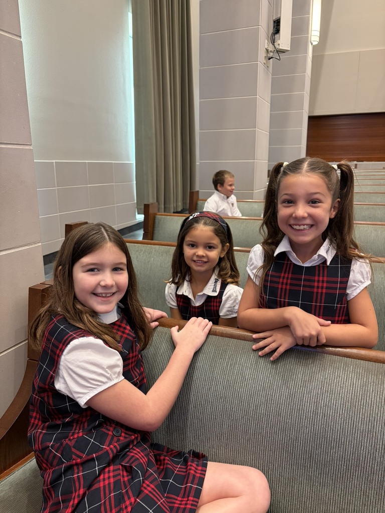 Posing for a photo just before Chapel starts!