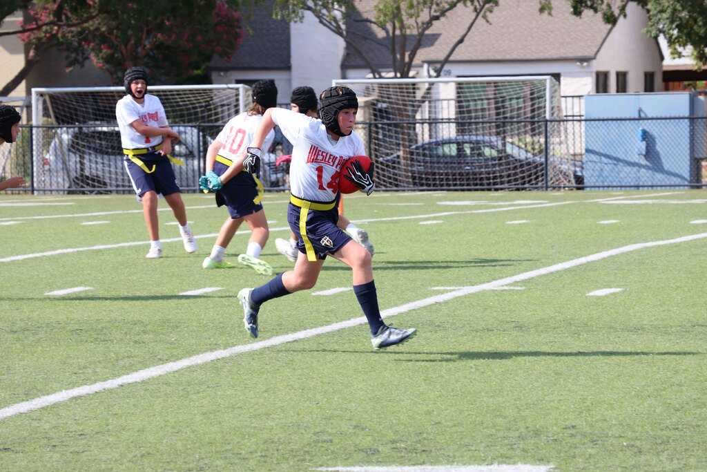 Running with the football.