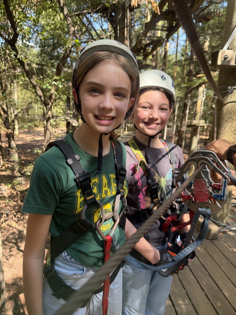 Smiling at the ropes course.