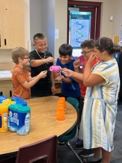 students working together in a citcle