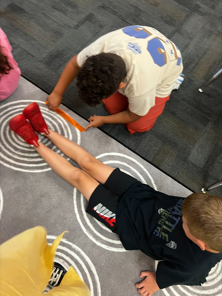 students on rug