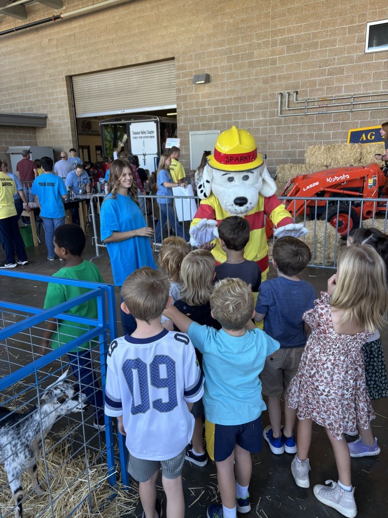 Students meet Spark the Fire Fighter's Dog