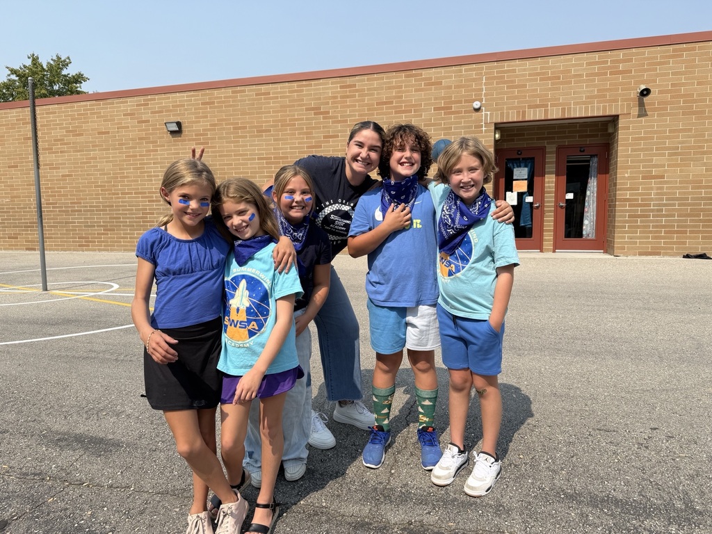 Mrs. Carrell and fourht grade students for school spirit day