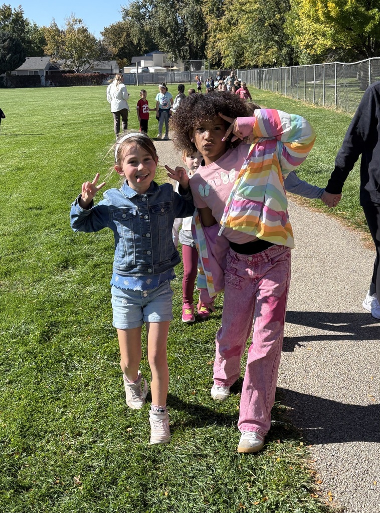 students walking track
