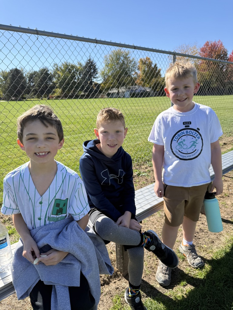 boys posing on track for picture