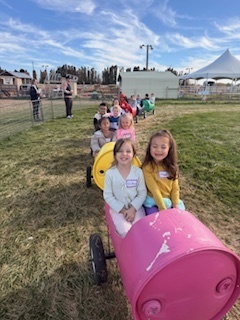 kids in barrel train