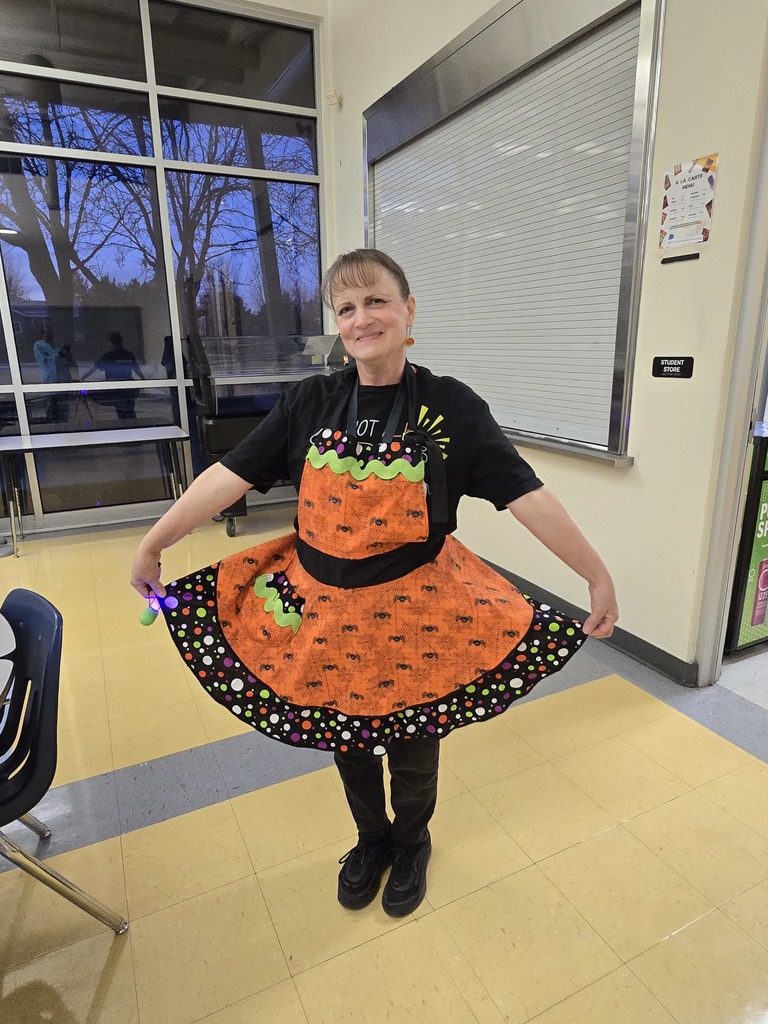 Mrs. Daybell in her Halloween apron