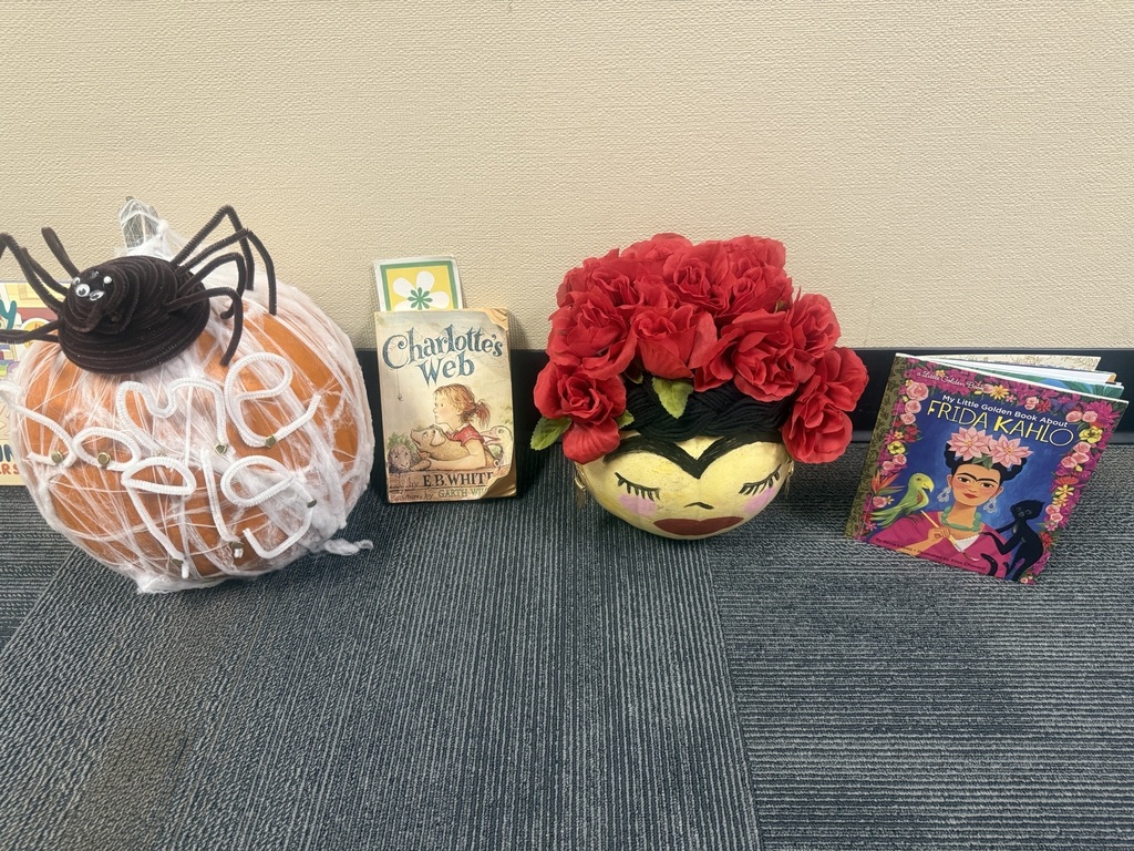 an image of pumpkins decorated for the books Charlotte's Web and Frida Kahlo