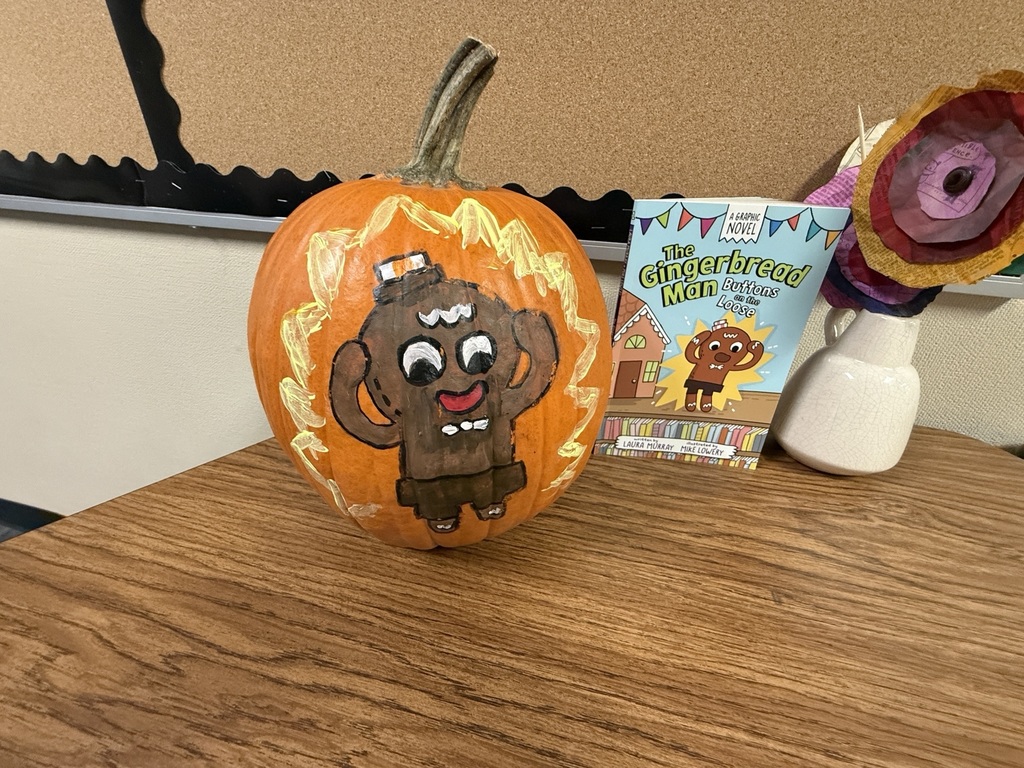 An image showing a pumpkin decorated for the Gingerbread Man