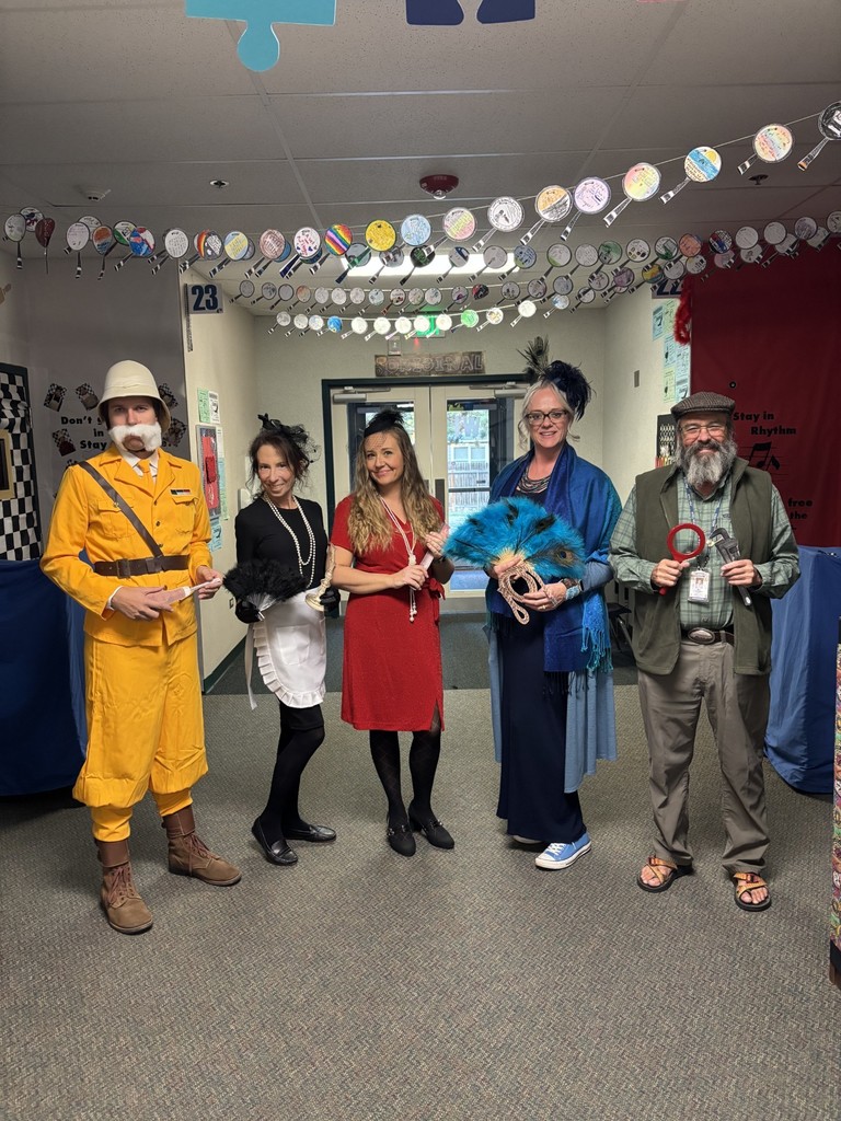 4th grade teachers dressed as characters from Clue