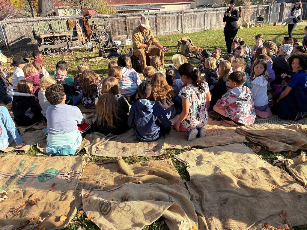 An image of students listening to a presentation