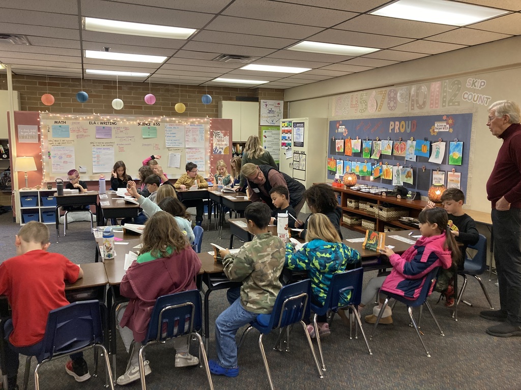 third graders getting dictionaries