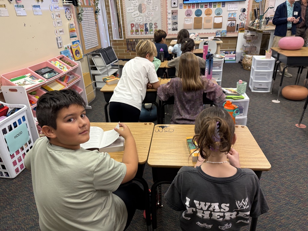 third graders getting dictionaries