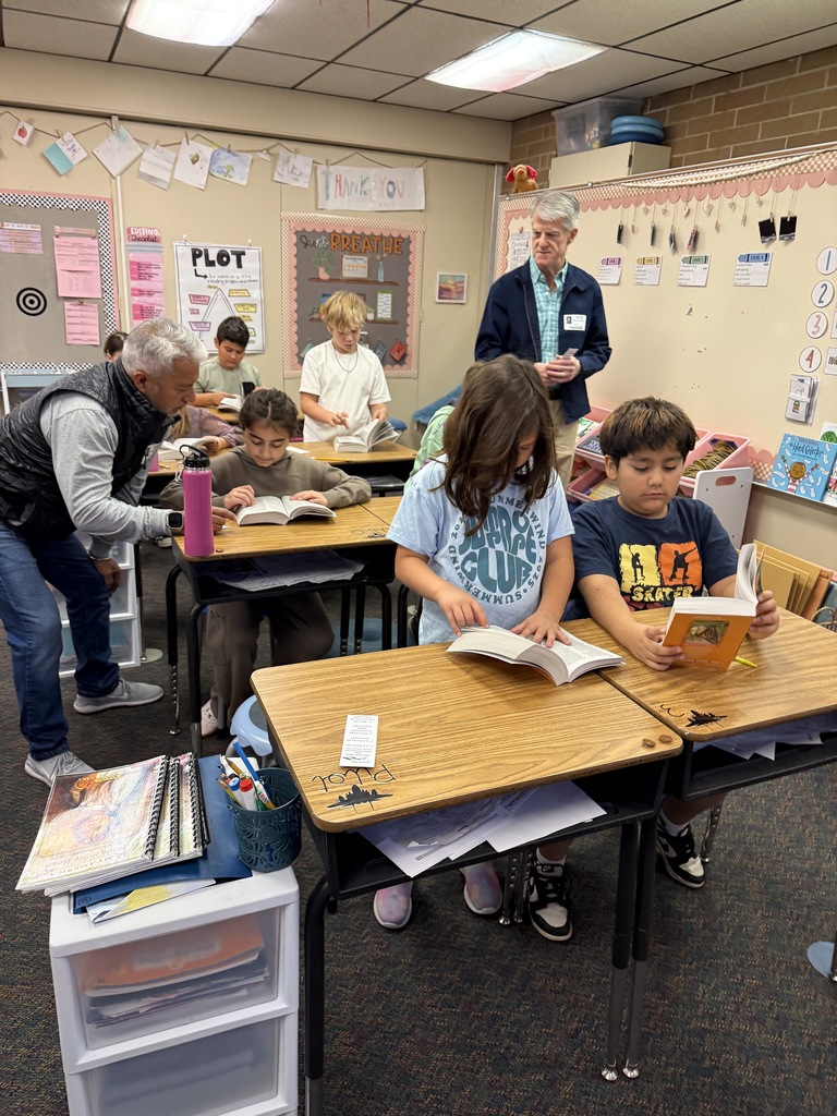third graders getting dictionaries