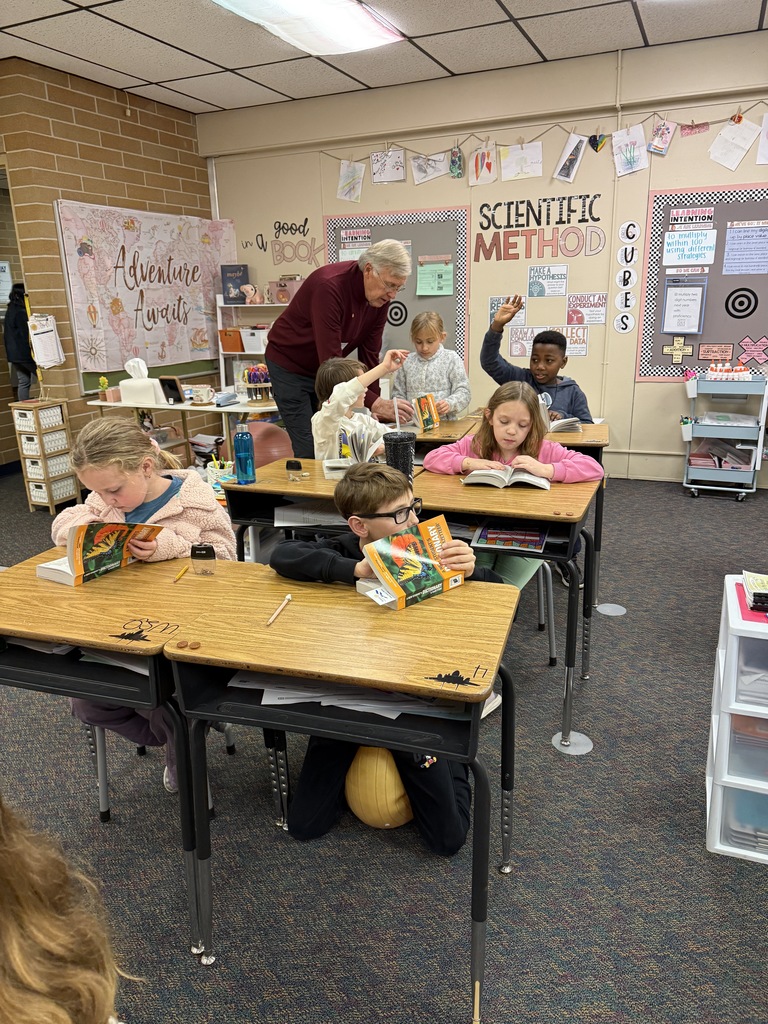 third graders getting dictionaries