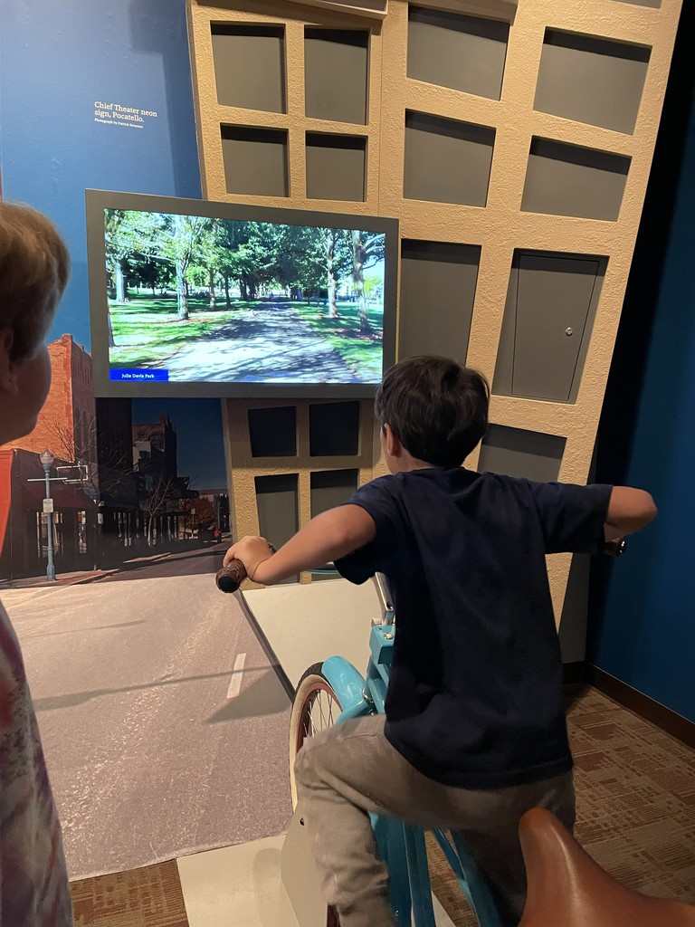 4th grader interacting with a virtual bike ride through Boise
