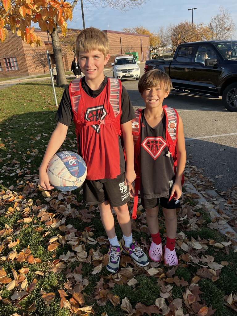 kids outside in fall leaves