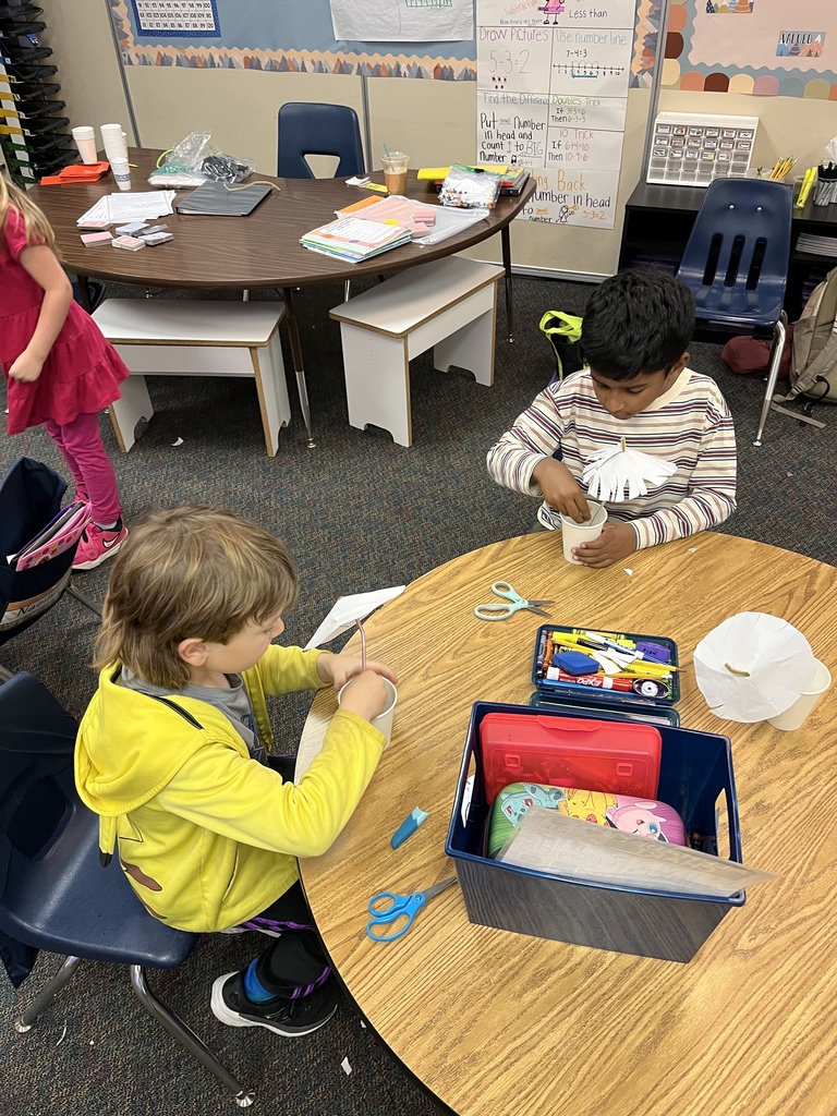 Mrs. Medley's first graders working on creating their umbrellas