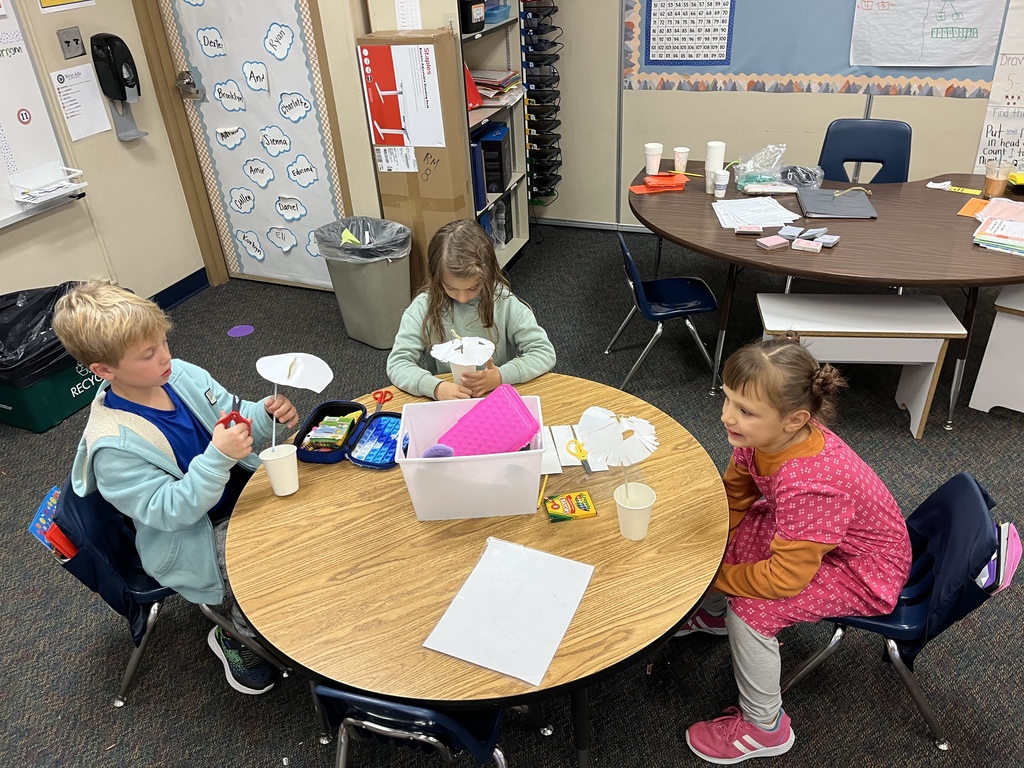 Mrs. Medley's first graders working on creating their umbrellas