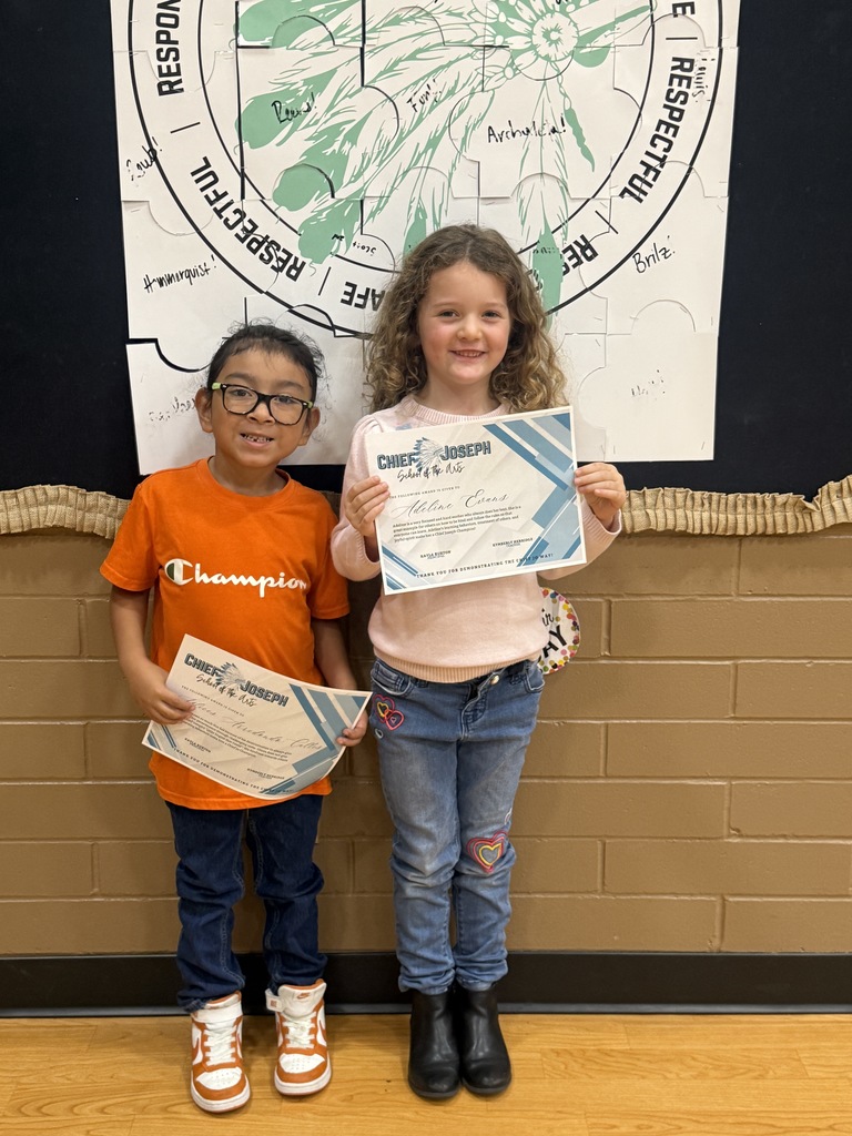 image of students holding awards