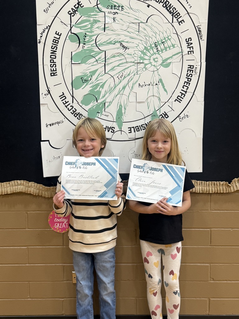 image of students holding awards