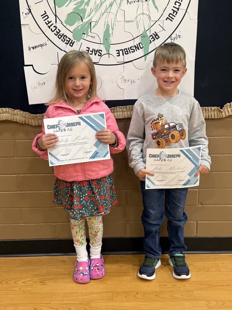 image of students holding awards