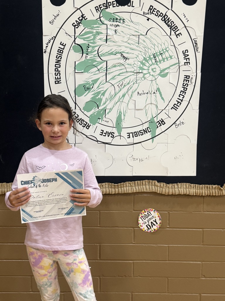 image of students holding awards