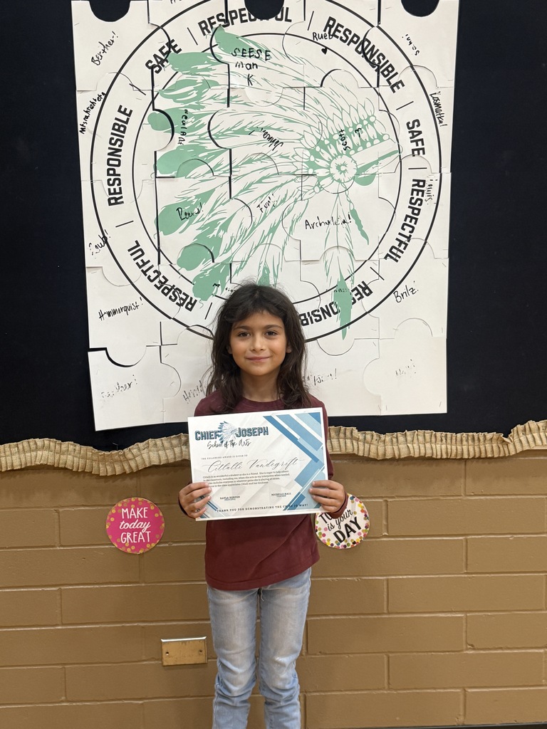 image of students holding awards