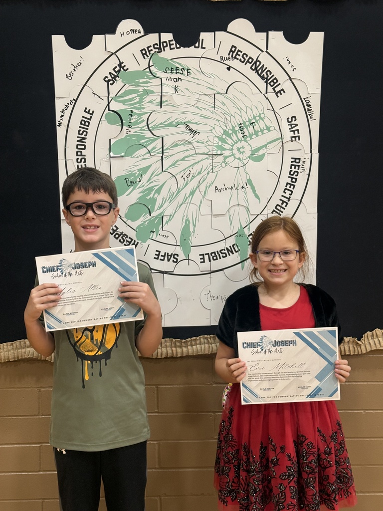 image of students holding awards