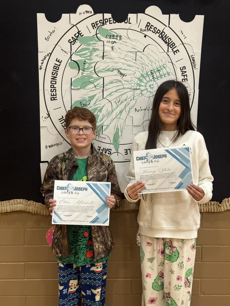 image of students holding awards