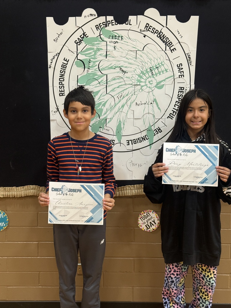 image of students holding awards
