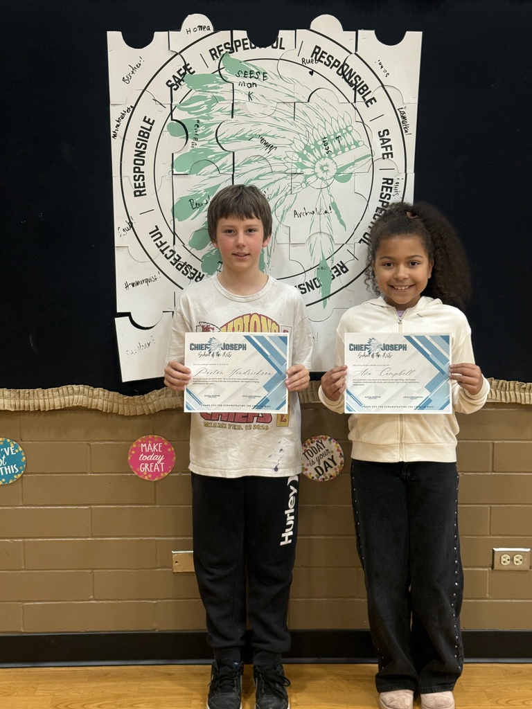 image of students holding awards