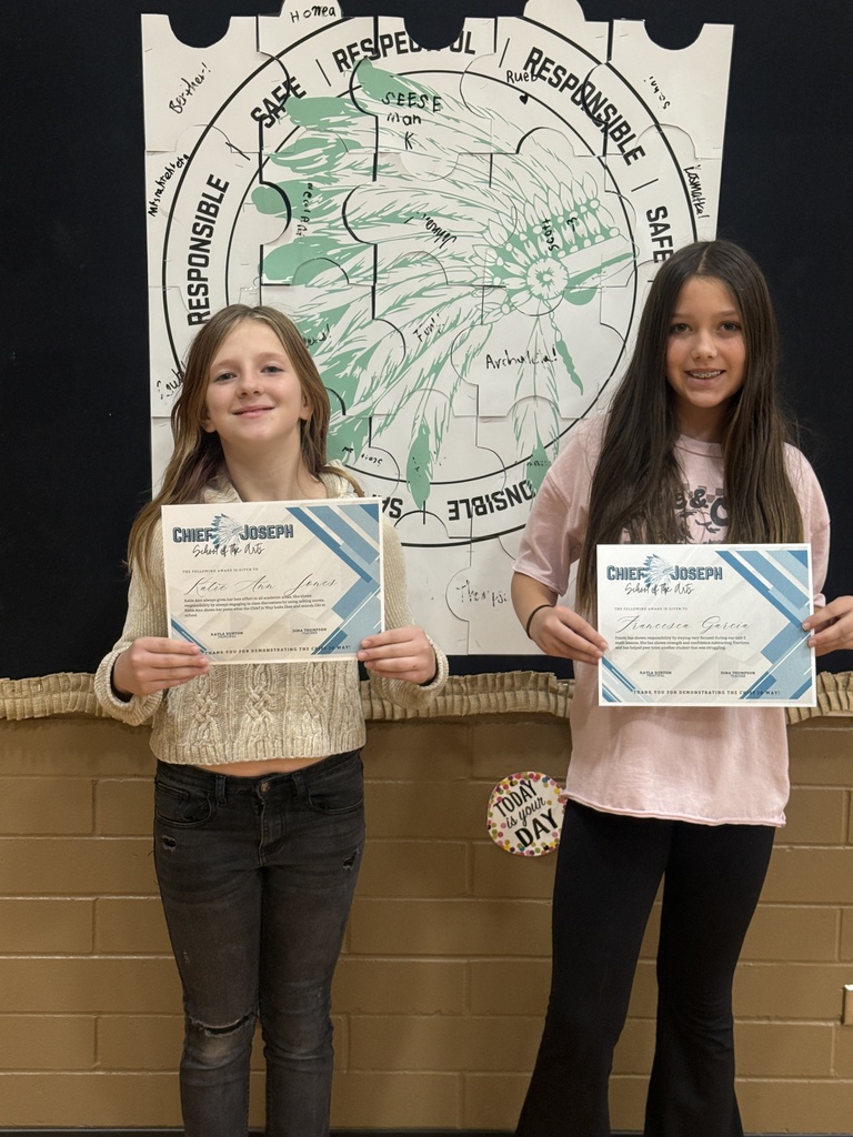 image of students holding awards