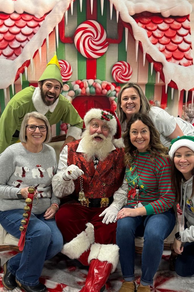 Santa Ron with staff