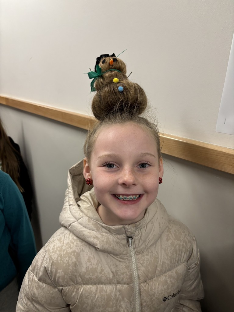 spalding student with her hair done up in a snowman!