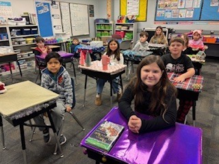 kids with decorated desks