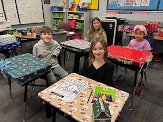 kids with decorated desks