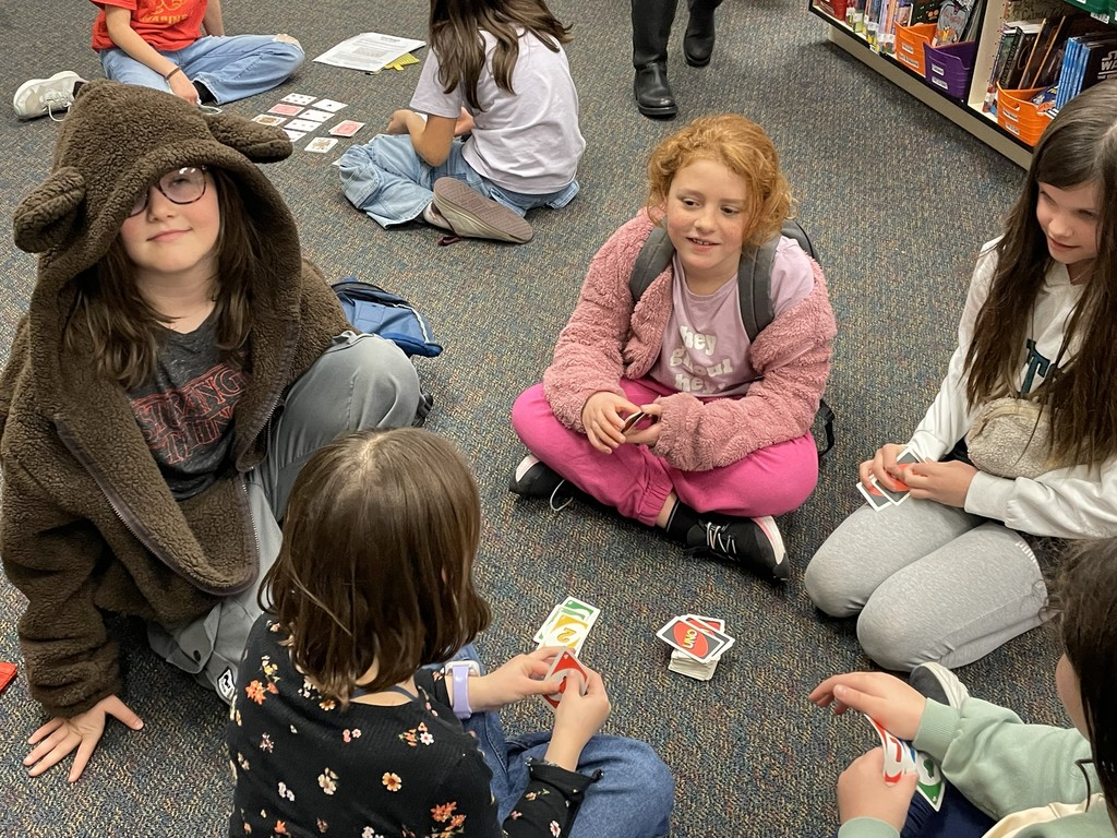  students playing card games. 